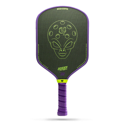 Purple pickleball paddle with green alien design on a white background