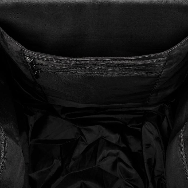 Close-up of a black jacket with a zipper detail on a dark background