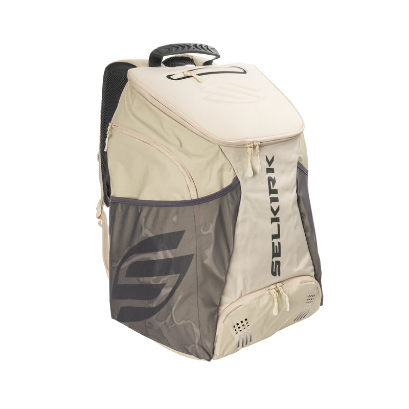 Beige and gray backpack with Selkirk branding on a white background