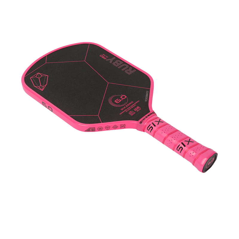 Pink and black pickleball paddle with 'Six' branding on a white background