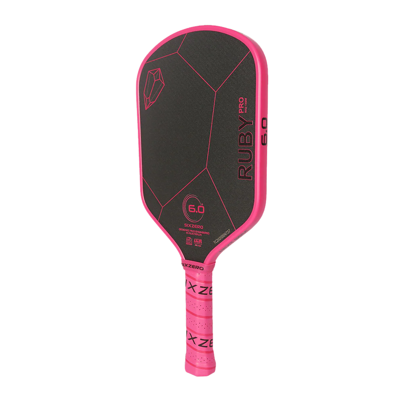 Black and pink pickleball paddle with 'Ruby Pro' branding on a white background