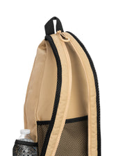 Beige drawstring bag with black mesh pocket on a white background