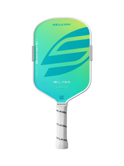 A Selkirk Boomstik LABS pickleball paddle featuring a vibrant green and blue gradient face, a white frame, and a white wrapped handle on a solid white background.