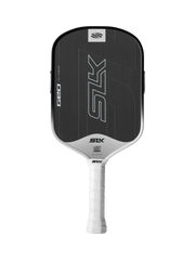 Pickleball paddle with black face and white handle on a white background