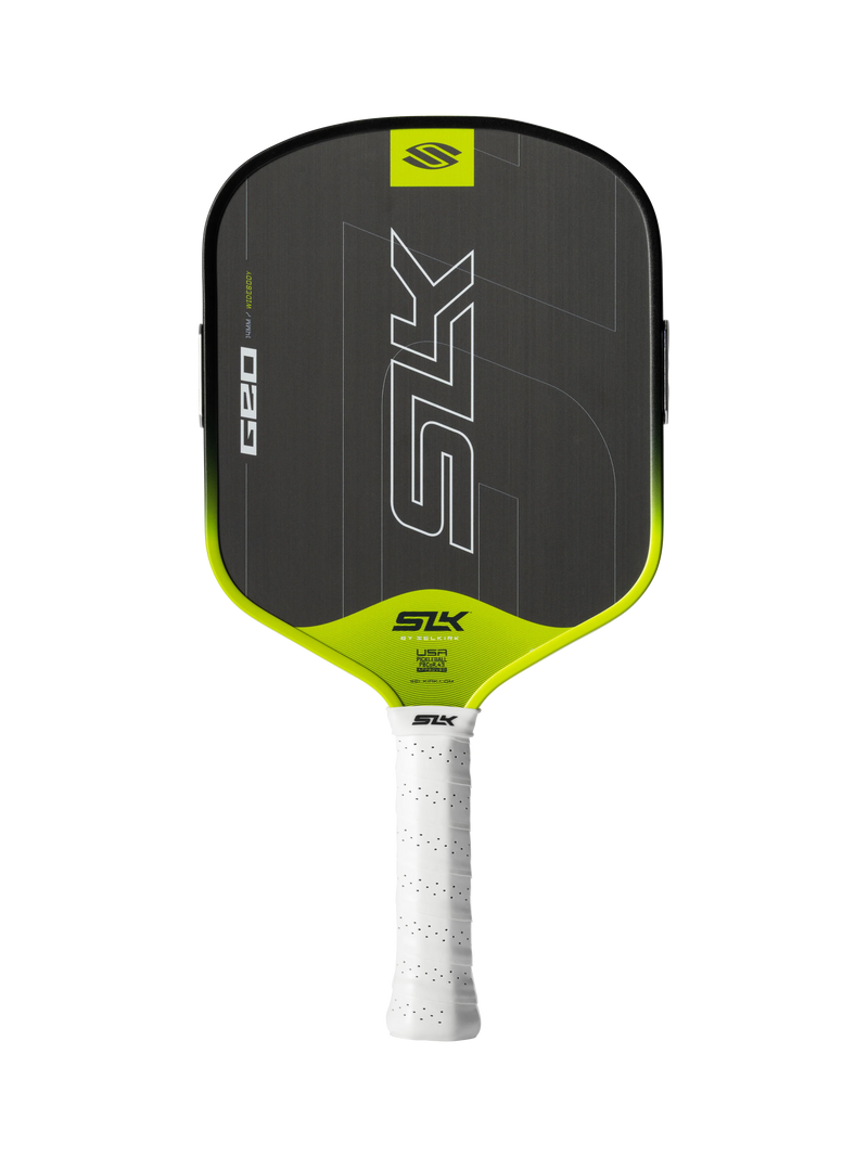 Pickleball paddle with black and green design on a white background
