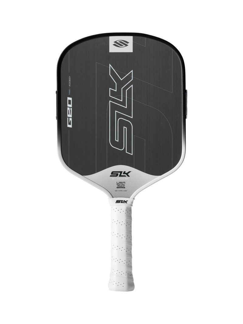 Black pickleball paddle with white handle on a white background
