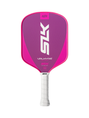 Pink pickleball paddle with white handle on a white background