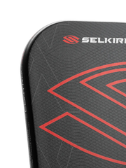 Black Pickleball Paddle with red accents and Selkirk logo on a white background