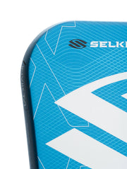 Close-up of a blue and white pickleball paddle with 'Selkirk' branding on a white background
