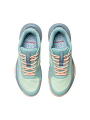 Pair of light blue running shoes with pink laces on a white background