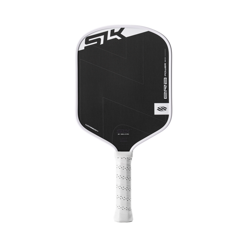 Black pickleball paddle with white handle on a white background