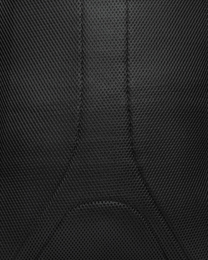 Close-up of a textured black fabric surface