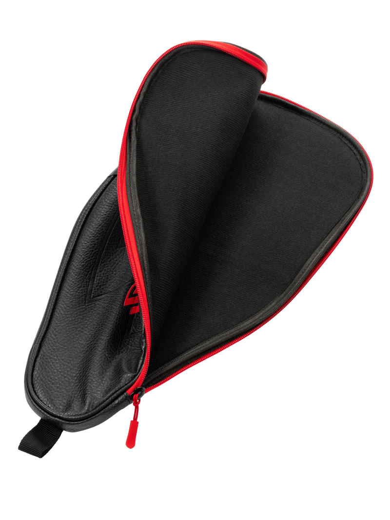 Black carrying case with red interior and zipper on a white background