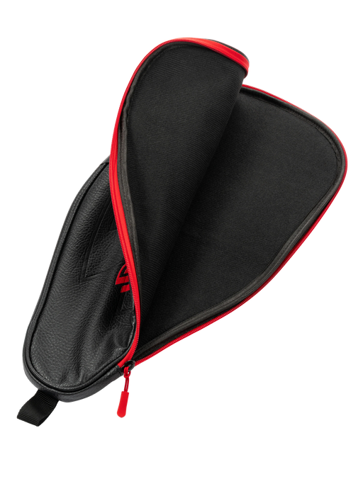 Black carrying case with red interior and zipper on a white background