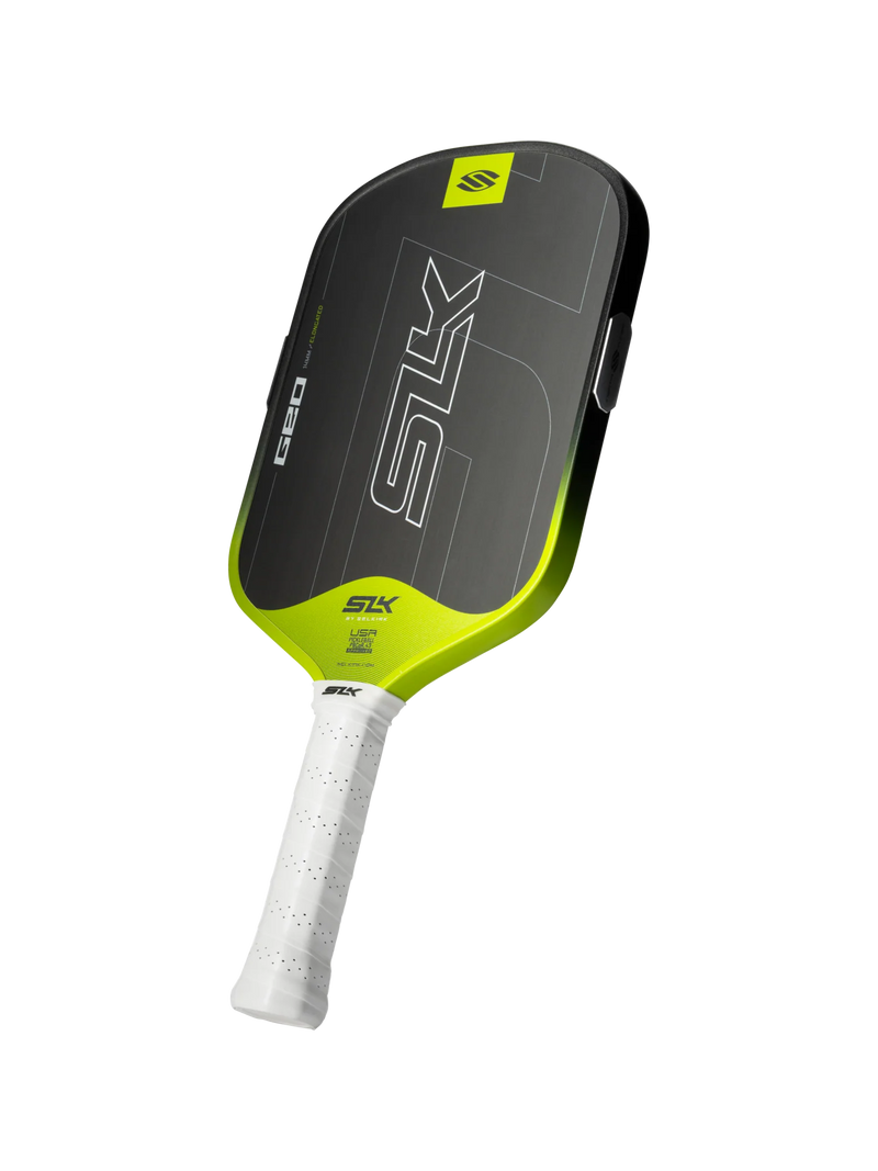 Pickleball paddle with black and green design on a white background