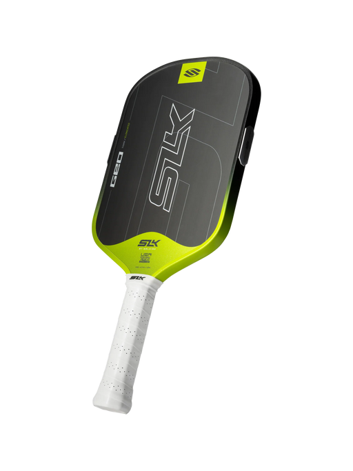 Pickleball paddle with black and green design on a white background