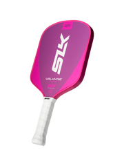 Pink pickleball paddle with white handle on a white background